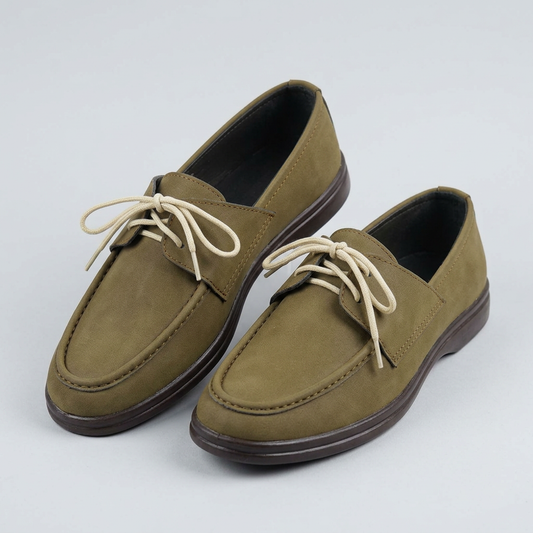 Khaki-tan boat shoe pair with cream laces on a studio background